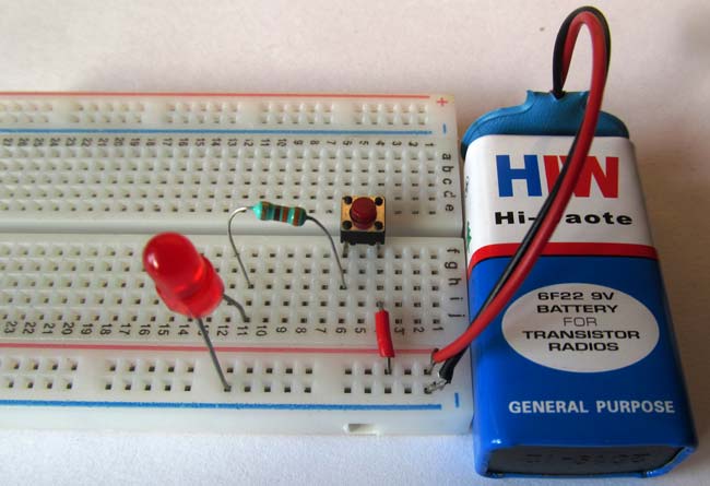 LED switch on breadboard
https://circuitdigest.com/electronic-circuits/push-button-led-circuit
